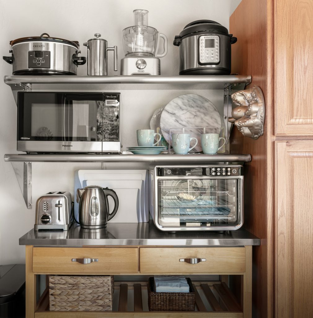 open shelving holds small appliances
